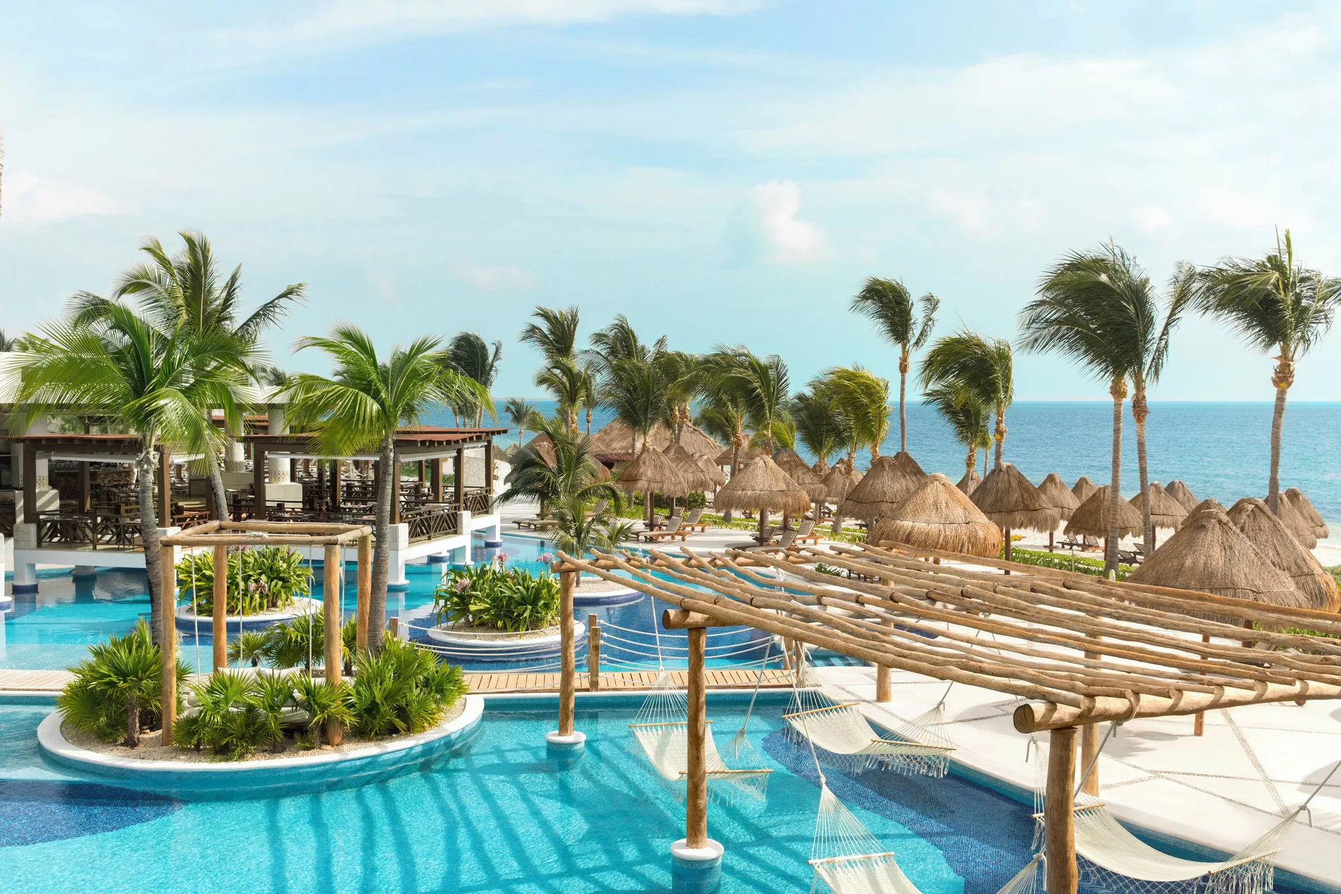 Excellence Playa Mujeres adults-only all-inclusive resort with suites and tropical pools